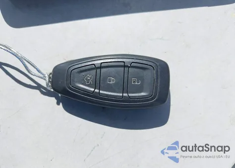 2014 Ford Fiesta Titanium z USA, uszkodzony, nr VIN 3FADP4FJ2EM133695